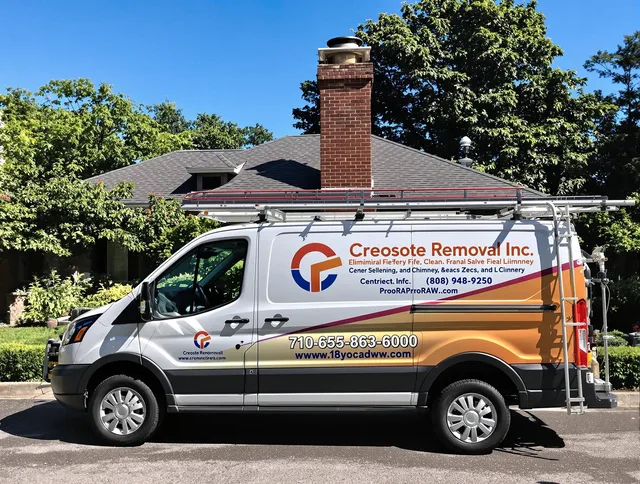 Davidson Chimney Sweep technician removing creosote safely in Davidson, NC